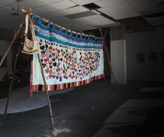 A quilt created by a communal effort, hosted by the Native Women's Association, in honour of missing and murdered Indigenous women and girls, was the centrepiece of last year's Social Fabric show. 