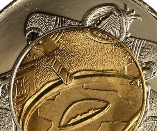 Inuk artist Germaine Arnaktauyok created the illustraition for the Nunavut 1999 coin.