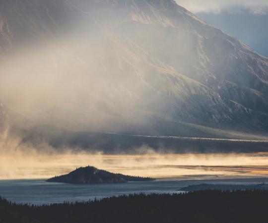 A dust storm rises on what was once the Ä’äy Chù riverbed. 